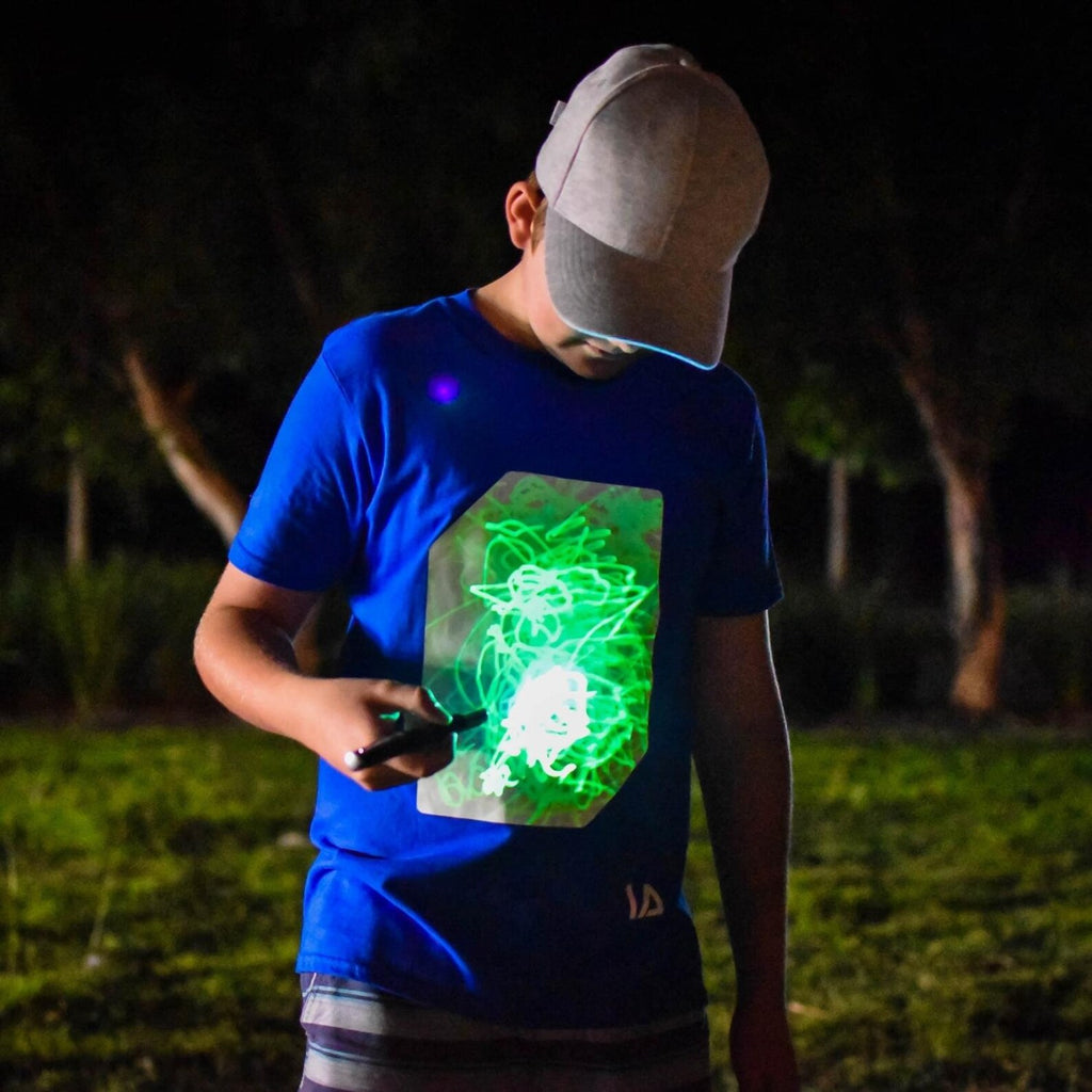 Illuminated Apparel Interactive Glow in The Dark T-Shirt - with Glow Pen Fun for Birthday Parties & Festivals - Light up The Night