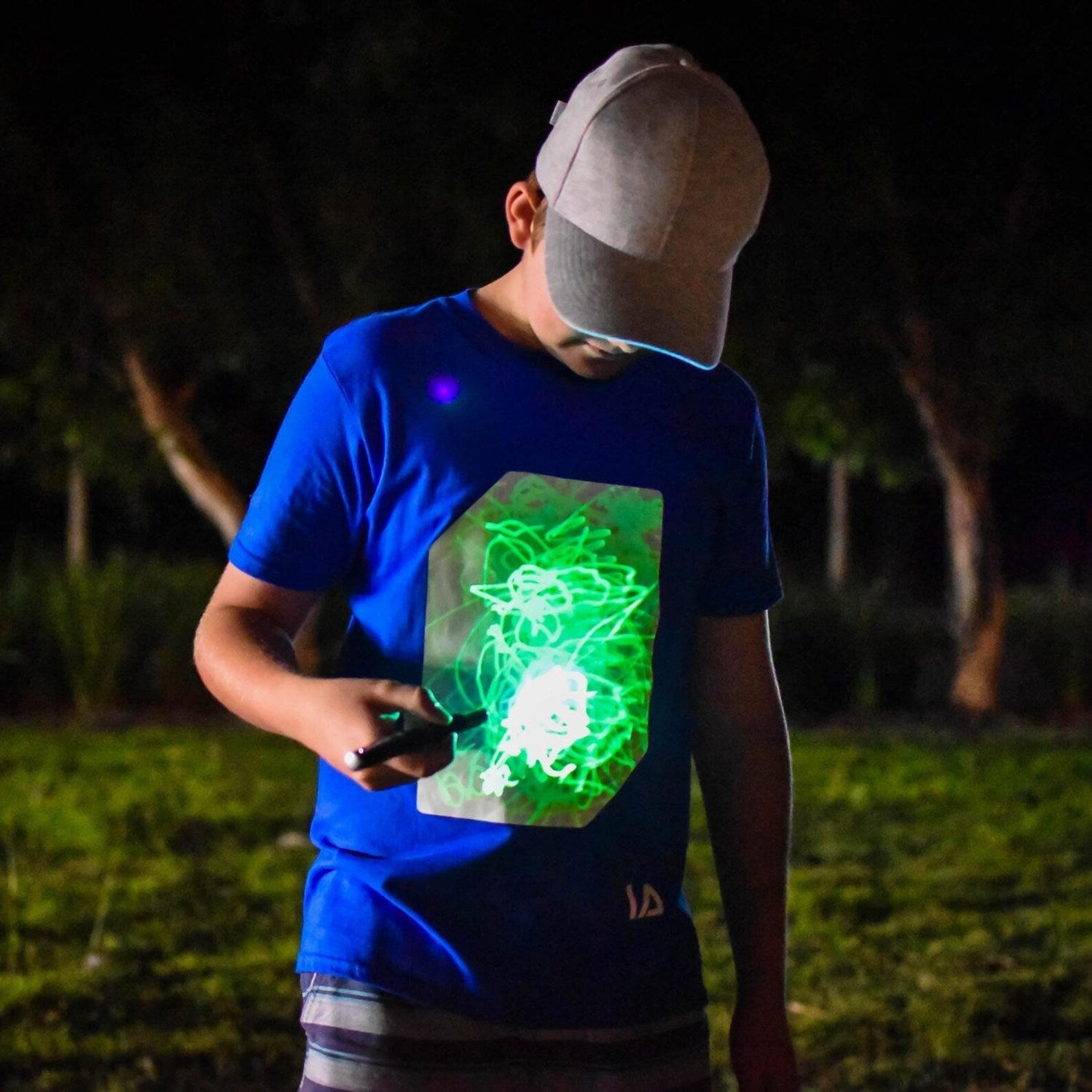 Illuminated Apparel Interactive Glow in The Dark T-Shirt - with Glow Pen Fun for Birthday Parties & Festivals - Light up The Night
