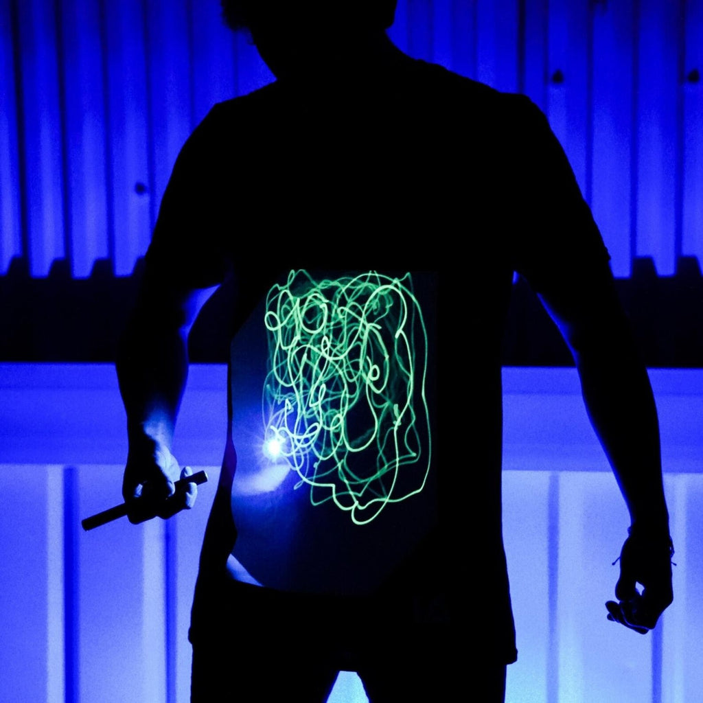 Illuminated Apparel Interactive Glow in The Dark T-Shirt - with Glow Pen Fun for Birthday Parties & Festivals - Light up The Night